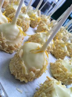 there are many desserts on the tray ready to be eaten