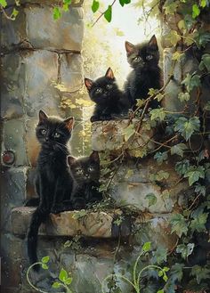 three black cats sitting on top of a stone wall