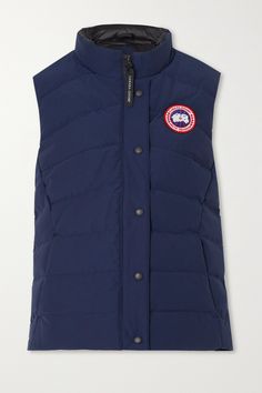 Ideal for transitional weather, Canada Goose's versatile 'Freestyle' vest adds just the right amount of warmth and layers comfortably over anything from a turtleneck to a lightweight jacket. It's made from durable quilted shell that's water- and wind-resistant and filled with insulating down. The pockets secure small essentials and the logo appliqué is an instantly recognizable detail. Canada Goose Women, Long Parka, Down Vest, Cozy Knits, Lightweight Jacket, Canada Goose, Womens Vest, Canada Goose Jackets, T Shirt Top