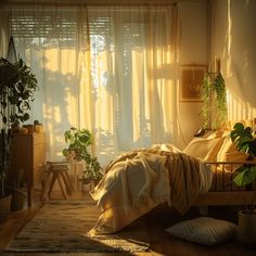 the sun shines through sheer curtains in a bedroom with plants on the side of the bed