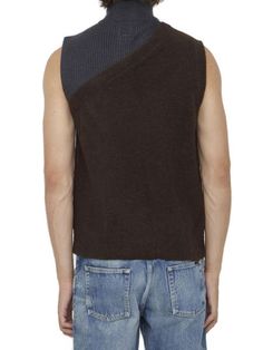 Elevate your style with our knitted vest, a fashion-forward layered item that combines sophistication with comfort. The stand-up collar and zip closure add a modern touch, while the blend of 53% wool, 12% polyamide, 2% elastane, and 33% alpaca wool ensures both warmth and flexibility. Whether you're dressing up for a special occasion or adding a chic layer to your everyday look, our knitted vest is the perfect choice. Crafted with quality materials and attention to detail, this vest is designed Leather Cap, Mens Fall, Knit Vest, Alpaca Wool, Sweaters Knitwear, Denim Pant, Womens Fall, Denim Top, T Shirt Dress