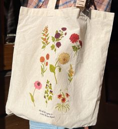 NEW! | "NEW CREATION" FLOWER TOTE He Would Love First, What Would Jesus Do, Fall Tote, Pink Keychain, Best Tote Bags, Flower Tote, University Tees, New Creation, Classic Bracelets