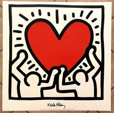 a red heart is in the middle of a black and white painting on a tile wall