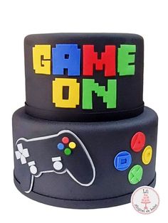 a black cake with the words game on it