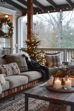 a living room filled with lots of furniture and christmas lights on the windows sill