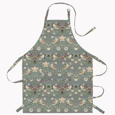 an apron that has birds on it and flowers in the middle, with two ties hanging down