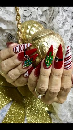 Over The Top Christmas Nails, Grinch Almond Nails, Christmas Stiletto Nails Winter, Christmas Stilleto Nails, Christmas Bling Nails, Bling Christmas Nails, Crazy Christmas Nails, Christmas Stiletto Nails, Stiletto Christmas Nails