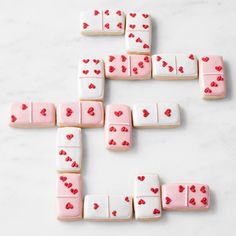 valentine's day cookies arranged in the shape of dominos