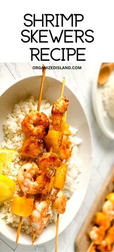 shrimp skewers are served over rice in a white bowl with pineapples