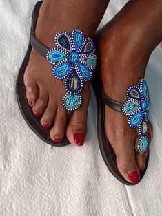 Beaded sandals, African sandals, women sandals, summer sandals, outdoor sandals, Look super great with this unique summer sandals, 100% handcrafted using beads , All sizes are available as we custom make them. For perfect fitting kindly use the last image as a  guide. Ships via dhl express. Welcome. Blue Beaded Sandals For Vacation, Blue Beaded Open Toe Sandals, Bohemian Beaded T-strap Sandals For Vacation, Blue Beaded Sandals For Beach, Beaded Round Toe Sandals For Beach Season, Summer Beaded T-strap Sandals With Open Toe, Beaded T-strap Sandals For Vacation, Summer Beaded T-strap Open Toe Sandals, Handmade Blue Sandals For Summer