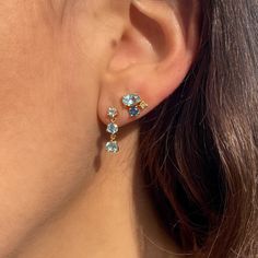 Dive into a deep iridescent pool of hues with this gorgeous 14K gold stud. A perfect cluster of stones that's set off by 0.01 Ct diamond set in a northern star, this handcrafted earring is nothing short of ethereal. Sold as a single stud. Gold Cluster Jewelry With Gemstone Accents, Northern Star, Star Studs, Handcrafted Earrings, Gold Stud, Diamond Set, Color Dorado, Pink Diamond, Blue Diamond