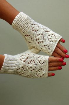 12 - Autumn glovesRomantic white Lace fingerless Gloves are hand knitted from the finest  wool yarn. Design is inspired by traditional Estonian lace (Haapsalu lace known as Sofia pattern) patterns.Those fingerless mittens are elegant, feminine and practical. Good for spring or autumn time weddings. This is my own design.One size fits most adults.Length:7,5" (19 cm)Width: 3,5" (9 cm)Thumb 1" (2,5 cm)Ready to ship! All parcels are shipped by registered airmail. Washing: Hand wash in warm water, la White One-size Knitting Pattern, White Hand Knitted Fitted Knitting Pattern, Fitted White Hand Knitted Pattern, Fitted White Crochet Knitting Pattern, Fitted White Hand-knitted Pattern, Knit Arm Warmers, Gloves Lace, Lace Fingerless Gloves, Knit Gloves