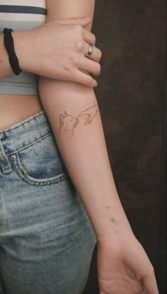 Cat tattoo 🫧 Fine Line Tattoo Ideas Meaningful, Cat Leaf Tattoo, Leo Cat Tattoo, Grandma Mother And Daughter Tattoo, Cat And Hand Tattoo, Aruba Inspired Tattoos, Cat Tattoo Floral, Simple Black Tattoos For Women, Magic Cat Tattoo