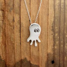 I call this guy the Quadrapus!  Super cute octopus charm necklace. This will bring a smile to your face each time you wear him.  Made from solid sterling silver and ships from my Oakland California workshop.For the smaller version:http://www.etsy.com/listing/62800802/little-quadrapus-necklaceFor the earrings:http://www.etsy.com/listing/62800831/quadrapus-earringsMother-Daughter Set:http://www.etsy.com/listing/67919329/mother-daughter-quadrapus-necklace-setItems are shipped without a receipt in a Fun Sterling Silver Jewelry In Silver Color, Fun Sterling Silver Jewelry In Silver, Handmade Fun Sterling Silver Jewelry, Nickel-free Sterling Silver Fun Jewelry, Silver Fun Necklace For Gift, Sterling Silver Novelty Necklace For Gift, Fun Silver Necklace For Gift, Octopus Necklace, Cute Octopus