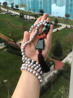 "✈️ Express & Worldwide Shipping ✈️ 🍃 MALA OF COURAGE; increases Self-Confidence and Eloquence. 🍃This Japa Mala reinforced with 'Green Jade' pendant; it's said to possess protective energies which dispel evils while you are traveling. Apart from that, green jade will teach you how to become more resourceful and creative. The stone will also motivate you not to be hindered thru your self-imposed restrictions. ☯️ 108 Mala beads (8mm) are: * Special White Quartz (Ceyt) (94), * Red Coral (2), White Beaded Bracelets With 108 Beads For Meditation, White Adjustable Mala With Gemstone Beads, Adjustable White Mala With Gemstone Beads, Adjustable White Mala With 8mm Beads, Adjustable White Gemstone Beads Mala, White Beaded Necklaces With Natural Stones For Meditation, White Gemstone Beaded Necklaces For Meditation, White 108 Beads Mala For Meditation, White Healing Mala With 108 Beads