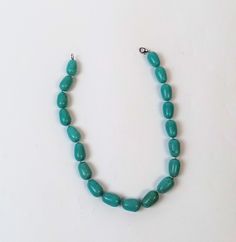 Vintage chunky turquoise howlite necklace with hand knotted large oval beads with silver tone clasp. Necklace is 46.5 cm/18.4 in long, the beads are 2cm/ 0.8in. Very good vintage condition with small defects on some beads. Turquoise Necklace With Oval Beads And Single Strand, Beaded Turquoise Necklace With Oval Beads, Handmade Turquoise Necklace With Oval Beads, Turquoise Beaded Necklace With Oval Beads, Vintage Oval Turquoise Necklace With Large Pendant, Vintage Turquoise Necklace With Polished Beads, Bohemian Turquoise Howlite Necklace, Turquoise Hand-strung Jewelry With Oval Beads, Wide Choker Necklace