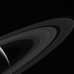 saturn and its rings in the dark sky