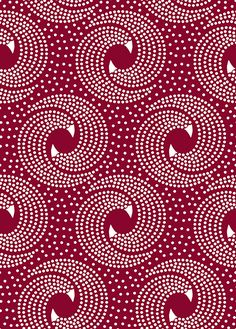 a red and white pattern with circles