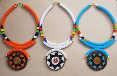 100% handcrafted using fine beads. Bright colors that will make you stand out from the rest. *This listing is for 5 necklaces. All different colors. Dimensions; 19 inches around the neck, 4 inch pendant. The closure is an S shape clasp. **Buy multiple items and pay shipping for 1 item only. More neckleces here; https://www.etsy.com/shop/TribalTess?ref=seller-platform-mcnav&section_id=21306083 Back to my shop; https://www.etsy.com/shop/TribalTess?ref=seller-platform-mcnav White Pendant Jewelry With Colorful Beads, White Beaded Round Pendant Necklaces, Multicolor Beaded Chain Necklace With Round Pendant, Multicolor Large Beaded Round Pendant Necklace, Multicolor Round Pendant Necklace With Beaded Chain, Beaded Chain As Gift, White Beaded Necklace With Unique Variations, Unique Long Beaded Necklace, Gift Jewelry With Large Beads