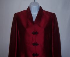 "Vintage Dana Buchman burgundy merlot or dark scarlet red Asian style silk blazer or suit jacket.  Good pre-owned condition.  No holes, rips, tears, etc.  Women's size 10P or PETITES.  Measurements:  bust-40\", length-23\".  100% silk.  Front frog style button closure.  Lined." Silk Long Sleeve Evening Suit, Elegant Burgundy Outerwear For Party, Elegant Burgundy Party Outerwear, Elegant Burgundy Blazer For Party, Elegant Long Sleeve Burgundy Blazer, Elegant Burgundy Party Blazer, Burgundy Long Sleeve Blazer For Formal Occasions, Burgundy Formal Blazer, Formal Burgundy Blazer