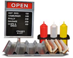 a hot dog stand with buns, ketchup and mustard in front of it