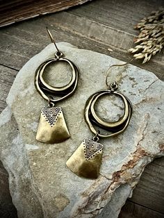 "Antiqued bronze with raw brass ear wires.  3\" L x 1.25\" W These are thick metal, not lightweight and will tug on your earlobes. ▲ To see more, click here to return to my shop: https://www.etsy.com/shop/AspenGlowStudio ▲ Don't forget to favorite my shop for updates Many of my designs have natural stones, these stones will slightly vary from one another so remember that yours may not be exactly like the ones pictured but they will be VERY similar.  Please be careful with your jewelry, they have Pendulum Earrings, Antique Gold Earrings, Earring Inspiration, Earrings Bohemian, Brass Jewelry, Raw Brass, Stainless Steel Jewelry, Bronze Color, Ear Wires