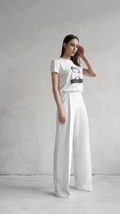 Discover the charm of our white palazzo trousers, expertly crafted from luxurious viscose fabric. Perfect for any body type, these handmade wide leg pants elegantly conceal the hips and enhance the waist, offering a silhouette that's both flattering and effortlessly chic. Ideal for versatile styling, they pair seamlessly with everything from shirts and bodysuits to T-shirts, making them a staple in women's clothing. ▪️ STYLE DETAILS - Relaxed fit with elastic waistband  - High waist  - Wide legs Elegant Summer Wide-leg Culottes, Elegant Ankle-length Pants For Wedding, Elegant Straight Culottes For Summer, Elegant Off White Straight Pants, Elegant Off-white Straight Pants, Elegant Off White Wide-leg Pants, Elegant Off-white Wide-leg Pants, White Wide Leg Pants For Spring Formal, White Wide Leg Pants For Formal Spring Events