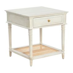 a white wooden table with drawers and wicker basket under the drawer, on an isolated white background