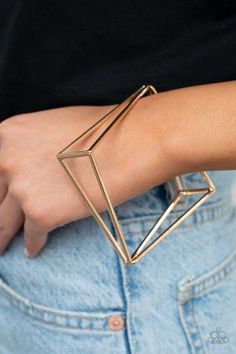 Exaggerated gold triangle frames connect at their edges to create a geometric bangle with three-dimensional drama. Retro Effect, Geometric Bangle, Gold Triangle, Geometric Bracelet, Rose Gold Beads, Another Dimension, Paparazzi Accessories, Blue Gems, Gold Bangle Bracelet