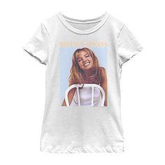 This Britney Spears graphic t-shirt is a fun iconic pop style to add to your little and big girl's casual wardrobe. Made from 100% cotton, it has a crew neckline and short sleeves. Style it with denim shorts or leggings. Character: Britney SpearsClosure Type: Pullover HeadFit: Regular FitNeckline: Crew NeckSleeve Length: Short SleeveFiber Content: 100% CottonFabric Description: KnitCare: Tumble Dry, Machine WashCountry of Origin: Imported Smile Poster, Poster Graphic, Graphic Styles, Baby One More Time, Tops Graphic, Sleeve Packaging, Casual Girl, Spears, Pop Fashion