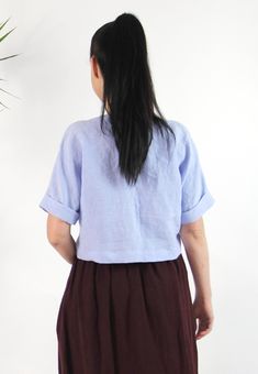 "Handmade 100% linen loose short sleeves blouse. Made with love for You. *100% local medium weight linen *Washed natural linen *Each item is individually cut and sewn by order *The model is wearing size S *Blouse color - Lilac blue *Note that colors may look different on your display depending on their settings and technical characteristics. Please let us know if you need different measurements or colors. CARE *Machine wash up to 40 / 104F gentle cycle *Iron inside out at medium high *Do not ble Blue Linen Top With Buttons, Blue Collared Linen Top, Blue Linen Short Sleeve Top, Light Blue Linen Short Sleeve Top, Spring Linen Short Sleeve T-shirt, Blue Linen V-neck Blouse, Short Sleeve Linen Shirt, Linen Kimono, Lilac Blue