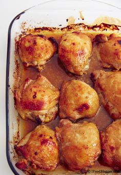 a casserole dish filled with meat covered in gravy