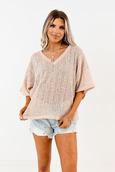 Need a versatile yet effortless summer basic? Then look not further than our light peach colored 'Vitamin Sea For Me' top featuring lightweight knit material, a wide v-cut neckline that can be styled off one shoulder, loose short sleeves, and a slouched silhouette that falls into a straight hemline! Measurements S : Bust 48", Hip 44", Length 21.5", Sleeve Length 6", Waist 42". M : Bust 50", Hip 46", Length 22.5", Sleeve Length 6.5", Waist 44". L : Bust 52", Hip 48", Length 23", Sleeve Length 6.5", Waist 46". Summer Basics, Vitamin Sea, Light Peach, Loose Shorts, Model Fits, V Cut, V Cuts, Women Clothing Boutique, Lightweight Knit