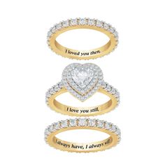 An exquisite reminder of your precious love story…The sparkle of over 100 Diamonisse simulated diamonds.Three enchanting 14kt gold-plated eternity bands represent your lifetime of love – yesterday, today and tomorrow.A showstopping simulated diamond center heart forms the crowning centerpiece of this magnificent ring set.The inside of the bands are inscribed with a touching sentiment.Arrives in our Danbury Mint Signature Packaging – perfect for gift-giving and safekeeping, included at no additio Personalized Diamond Stackable Rings For Wedding, Personalized Diamond Stackable Wedding Rings, Anniversary Cubic Zirconia Eternity Band With Halo, Anniversary Eternity Band With Halo Cubic Zirconia, Cubic Zirconia Halo Eternity Band For Anniversary, Anniversary Bridal Sets With Halo Setting In Cubic Zirconia, Anniversary Stackable Halo Rings In Cubic Zirconia, Anniversary Halo Stackable Rings In Fine Jewelry Style, Anniversary Eternity Band With Halo Setting