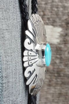 This turquoise and sterling silver bolo tie was made by Navajo silversmith Rosita Singer. The back is signed T&R Singer and stamped sterling.Tie Length: 23"Length: 2 1/4"Width: 1 7/8"Tips:Length: 2 1/8"Width: 1/4"Free shipping on all orders! We ship with USPS and always include tracking. All orders ship within a day of payment.Returns are accepted up to 30 days after you receive your order. Just send us a message. Our shop offers cash back or store credit. The item must be returned in new condit Tie Length, Bolo Tie, Native American Jewelry, Turquoise Sterling Silver, Free Jewelry, Turquoise Bracelet, Turquoise, Sterling Silver, Free Shipping