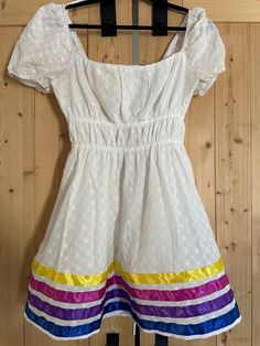 Native Baby Doll Ribbon Dress. The dress is Windsor brand size Medium. The Ribbons are blue, Pink, Yellow. 100% Cotton. Great to wear to a day at the Pow Wow or can be dresses up for an evening event. Fitted Short Sleeve Mini Dress For Dress-up, White Fitted Mini Dress For Dress-up, Ribbon Dress, Pow Wow, Cute Everyday Outfits, Phoenix Az, Dress Clothes For Women, Baby Doll, Pink Yellow