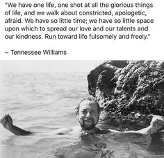 a man swimming in the water with his head above the water and an image of a rock behind him that reads, we have one life, not at all the glorious things