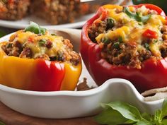 two stuffed peppers with meat and vegetables in them