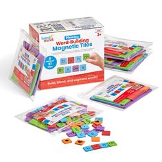 the magnetic words and numbers game is in its box with plastic sleeves on it's sides