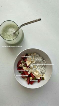 a white bowl filled with cereal next to a glass of milk