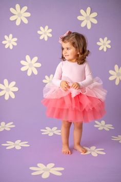 We adore the softness of powder pink, but adding a pop of vibrant pink makes it even more fun! The Pink Love Tutu Dress brings together soft and bright shades of pink, making it the perfect dress for any little one who loves to stand out. Design Features: This dress features a crew neckline with long sleeves, adding both elegance and practicality. The back has a snap closure for easy dressing, and the bodysuit includes a snap detail at the bottom for added convenience. Color & Material: The Pink Love Tutu Dress combines a pink lycra bodysuit with a tutu skirt made of layered powder pink and vibrant pink tulle, creating a beautiful and lively look. (Please note: slight color variations may occur between the product and photos due to lighting.) Comfort & Style: This dress is designed for bot Pink Tulle Skirt, Rose Love, Dress For Girls, Easy Dressing, Pink Tulle, Tutu Skirt, Powder Pink, Pink Love, Tutu Dress