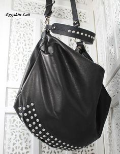 Alternative Style Bags With Rivets For Everyday Use, Studded Shoulder Bag For Everyday Use, Crossbody Style, Everyday Leather Shoulder Bag With Studs, Alternative Style Shoulder Bag With Rivets For Everyday, Leather Bags With Rivets For Alternative Fashion, Alternative Style Rivets Shoulder Bag For Everyday Use, Edgy Leather Bags For Concerts, Leather Bag With Rivets For Concerts, Leather Shoulder Bag For Concert