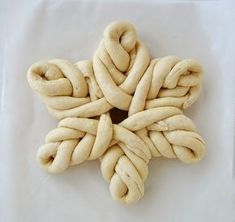 a star shaped pastry sitting on top of a white table