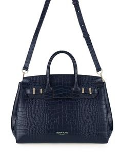 DESIGN The new Gigi handbag encapsulates Teddy Blake's modern-classic appeal. Made in Italy from croco embossed calf skin the semi structured silhouette is reworked to fit an on-the-go lifestyle. The detachable strap allows it to be styled over the shoulder and the roomy interior can fit all your daily essentials &