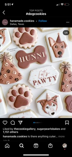 some cookies that are on top of each other in the shape of dogs and cats