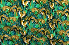 a green and yellow fabric with leopards, leaves and plants on the back ground