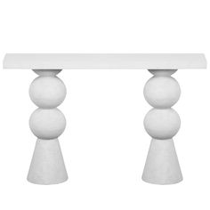 a white table topped with three balls on top of it's legs and two bases