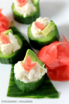 cucumbers with cream cheese and salmon on them