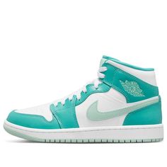 Introducing the new Women's Air Jordan 1 Mid Marine Green sneakers. A bold offering from Jordan brand, these shoes proudly symbolize the legacy of Michael Jordan and his original Air Jordan 1s from 1985. Crafted with high-top construction and white laces, these sneakers feature island green highlights that subtly stand out against the predominantly white upper. Core details like the Nike Swoosh on the side, the Air Jordan logo on the outer ankle, and Jumpman logo on the tongue complete for a modern look that is steeped in tradition. The sleek design of the Women's Air Jordan 1 Mid Marine Green successfully combines style with substance for a sneaker worthy of any look. (AJ1/SNKR/Retro/Mid Top/Women's/Basketball) Cute Jordans, Air Jordan Logo, Green Jordans, Original Air Jordans, Wmns Air Jordan 1, Air Jordans Women, Air Jordan 1s, Jordan Logo, Preppy Shoes