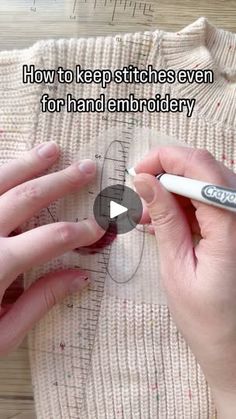 two hands are drawing on a piece of fabric and the words how to keep stitches even for hand embroidery